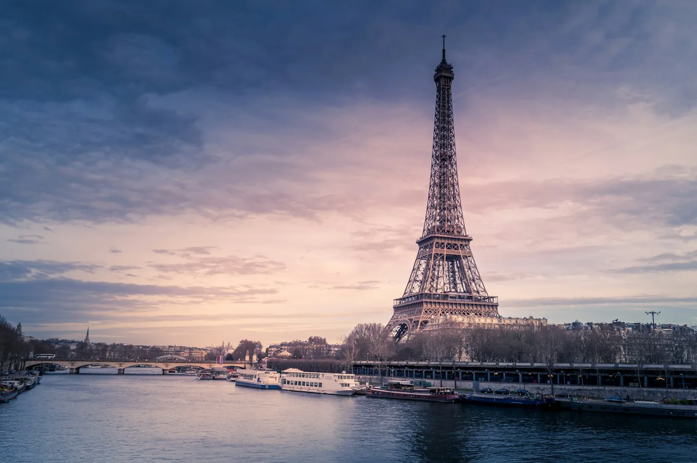 Eiffel Tower and river at dusk